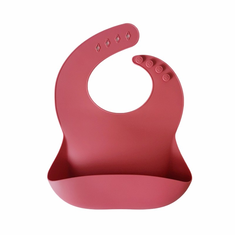 Babero de silicona Magenta Storki